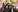 Birkbeck graduates throw their graduation caps in the air at the Spring Graduation in April 2024