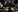 An AI generated image of two people showing frustration at what they're seeing on their computers